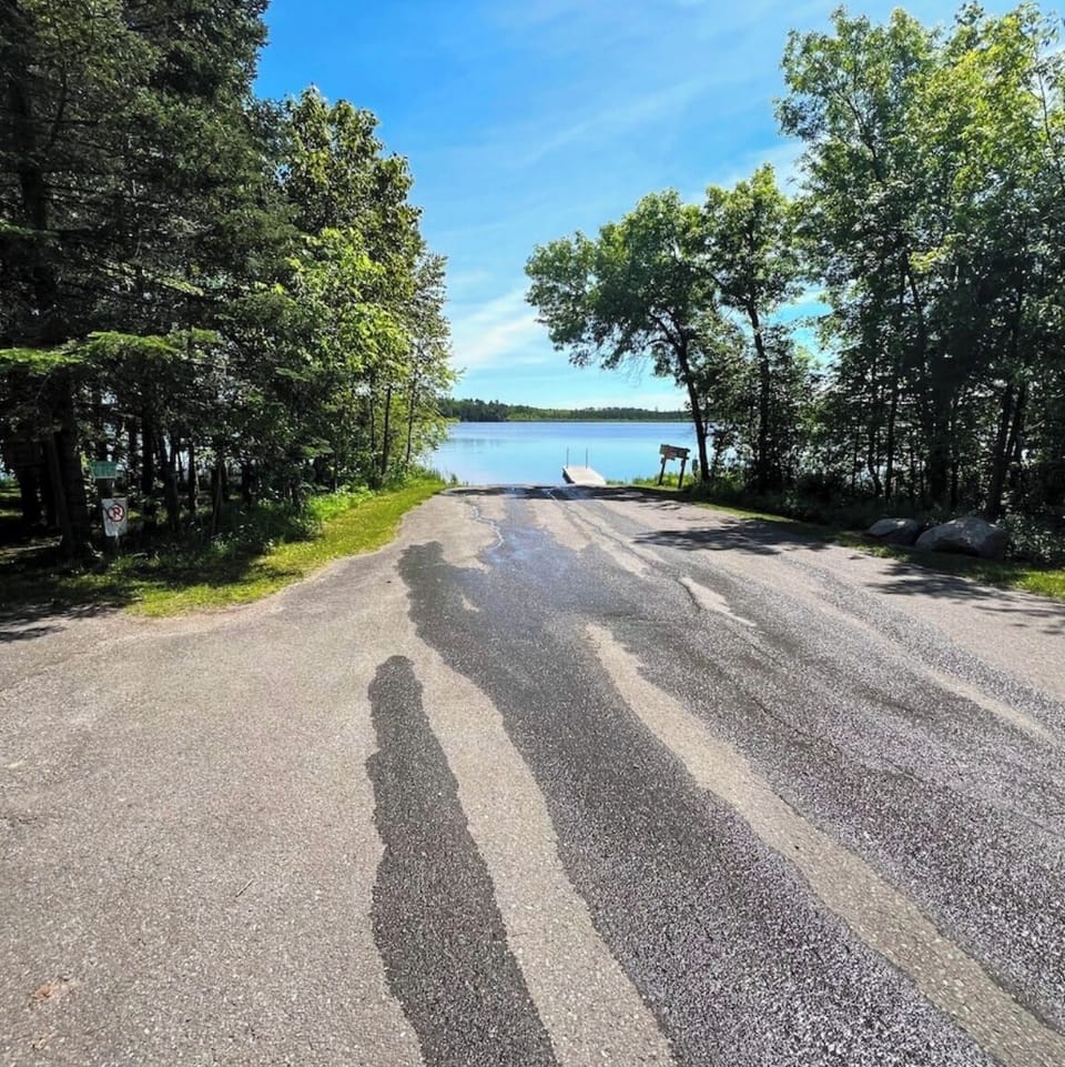 Public Boat launch literally right next to the drive way!