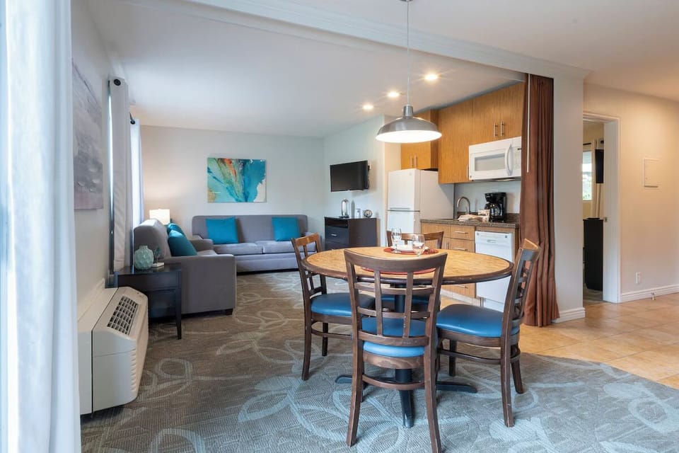 Gather for dinner in an open layout made for togetherness.