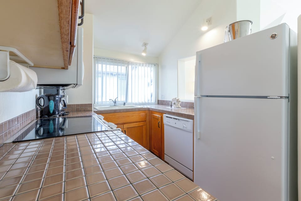 Prep quick bites in the handy kitchenette with essentials nearby.