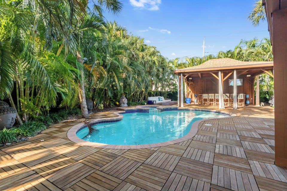 A beautiful pool surrounded by nature.