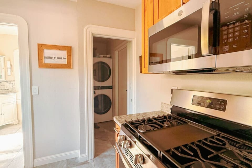 Enjoy the convenience of an in-unit stacked washer and dryer just steps away - perfect for longer stays and keeping everything fresh and easy during your visit.