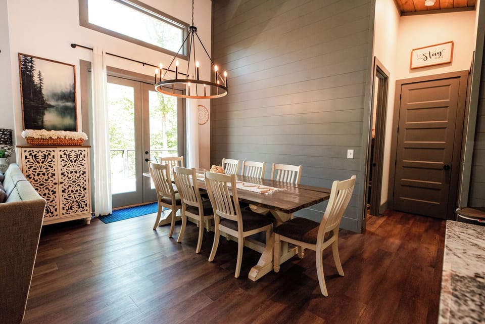 Bright dining space with vaulted ceilings and seating for the whole group