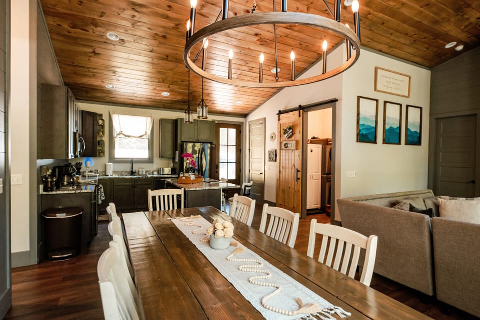 Rustic open dining and kitchen space with farmhouse charm and room to gather