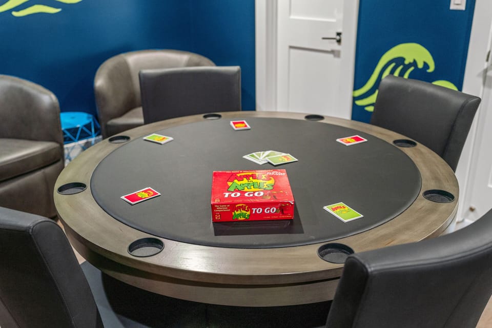 Play cards, a board game or build a puzzle at the game room poker table. 