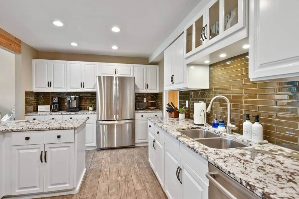 The wood door on the right is to the Laundry room