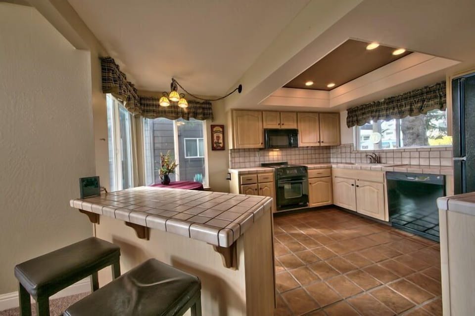 Fully Equipped Kitchen with Counter Seating