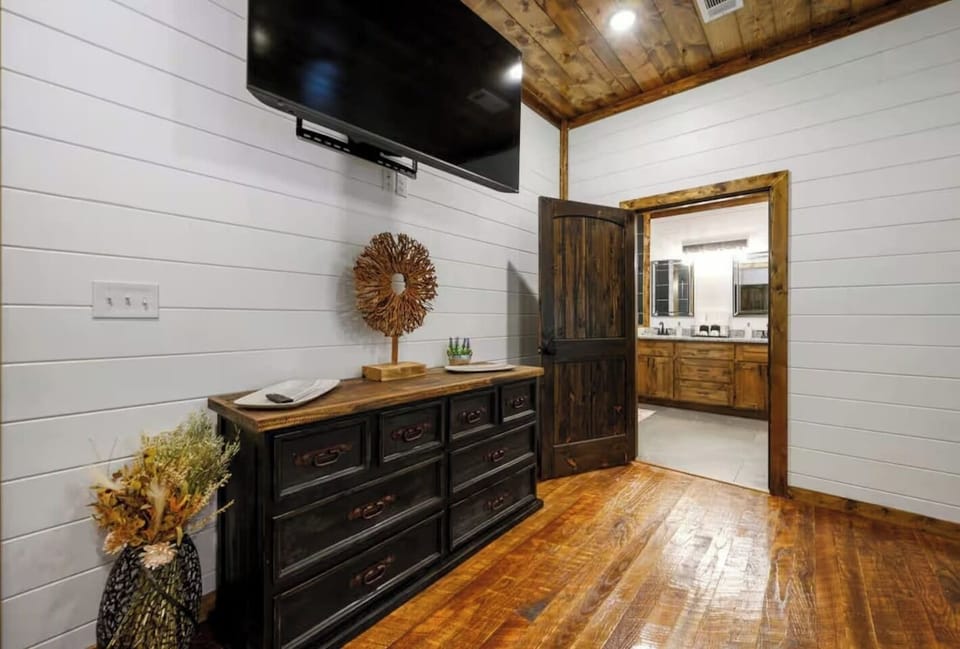  Cozy up for a movie night, then unwind in the connected bathroom just beyond.