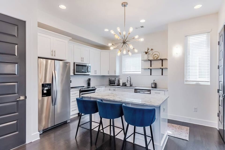 Pops of modern decor and color accent the space