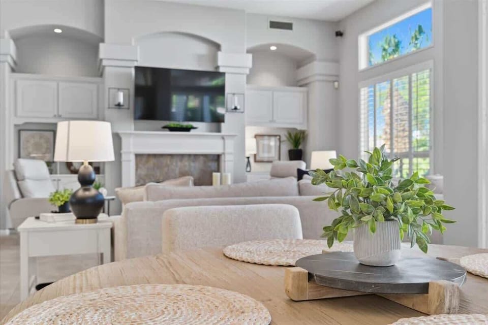 The breakfast nook offers seating for four with lovely views of the backyard, creating a perfect spot for casual meals.