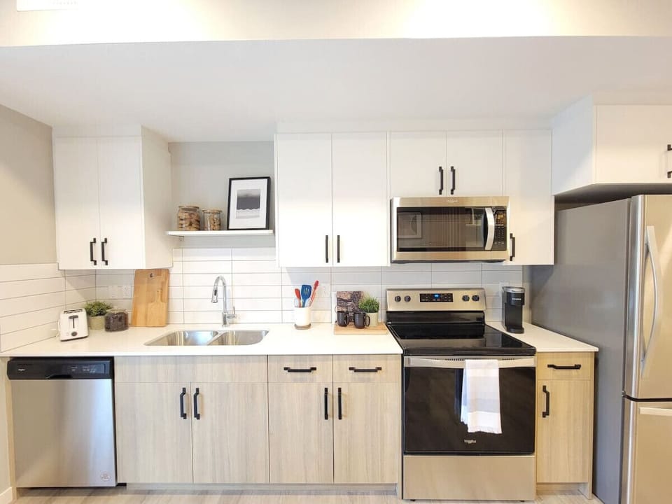 Full kitchen with everything needed for a long term stay! Kurig coffee machine and coffee supplied!