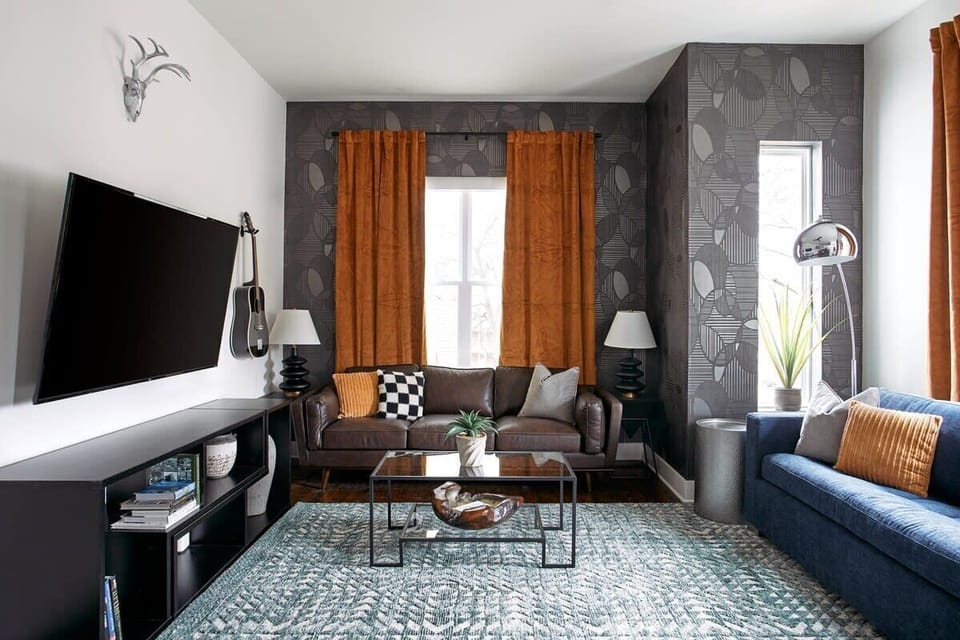 Step into the living room of The Austen, one of three cozy, stylish spaces ready for your group to gather and unwind.