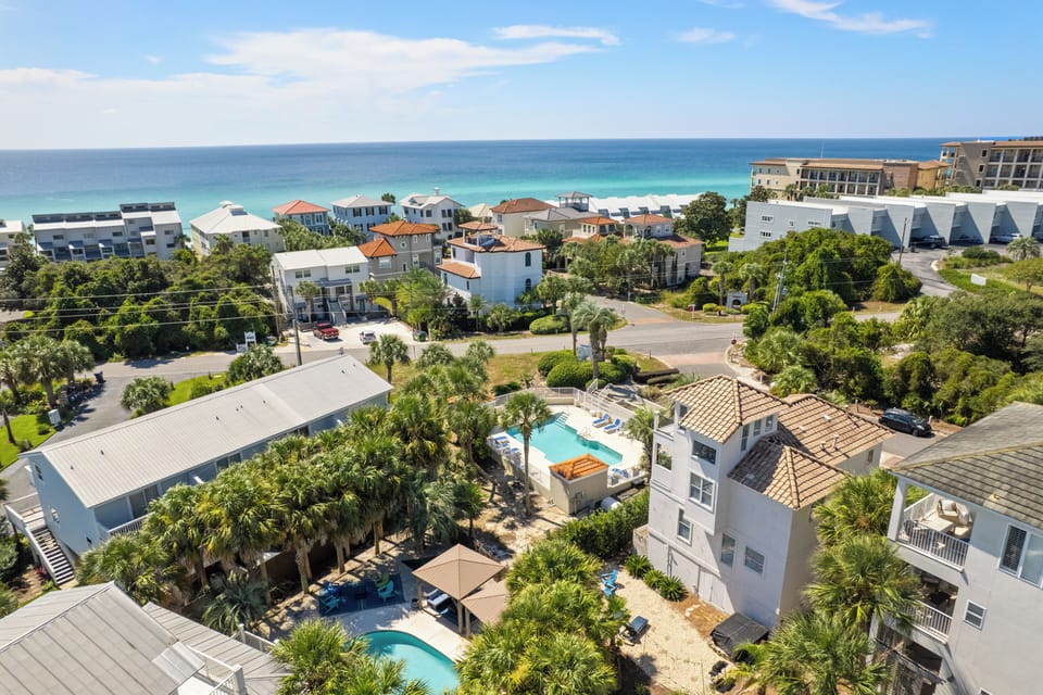 Aerial highlighting Gulf views and coastal neighborhood.