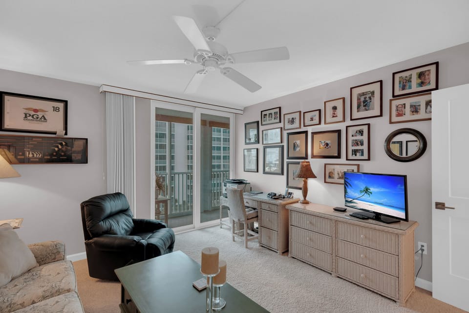 Guest bedroom has been converted into an office space/ 2nd living room