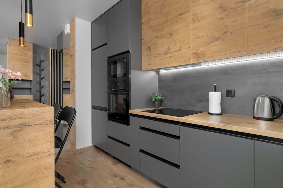 The kitchenette's practical layout maximizes space and functionality.