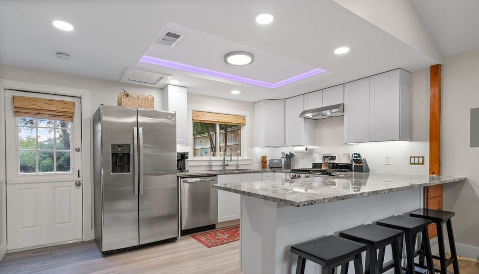 Whip up vacation favorites in this fully equipped kitchen, and bar seating for four.