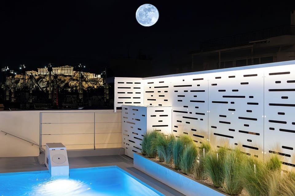 Acropolis by night from your private heated pool