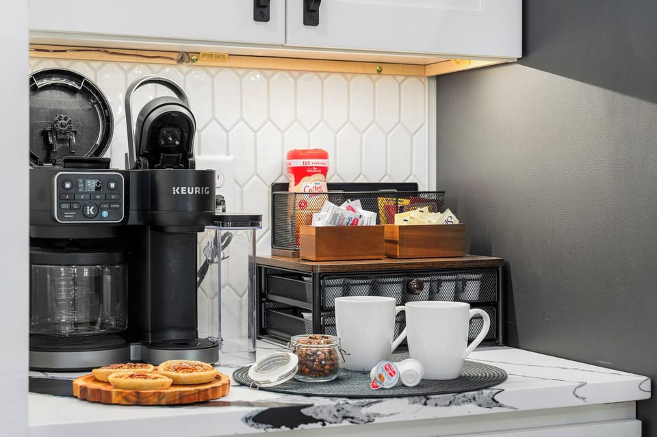 Kitchen stocked with coffee, tea and hot cocoa
