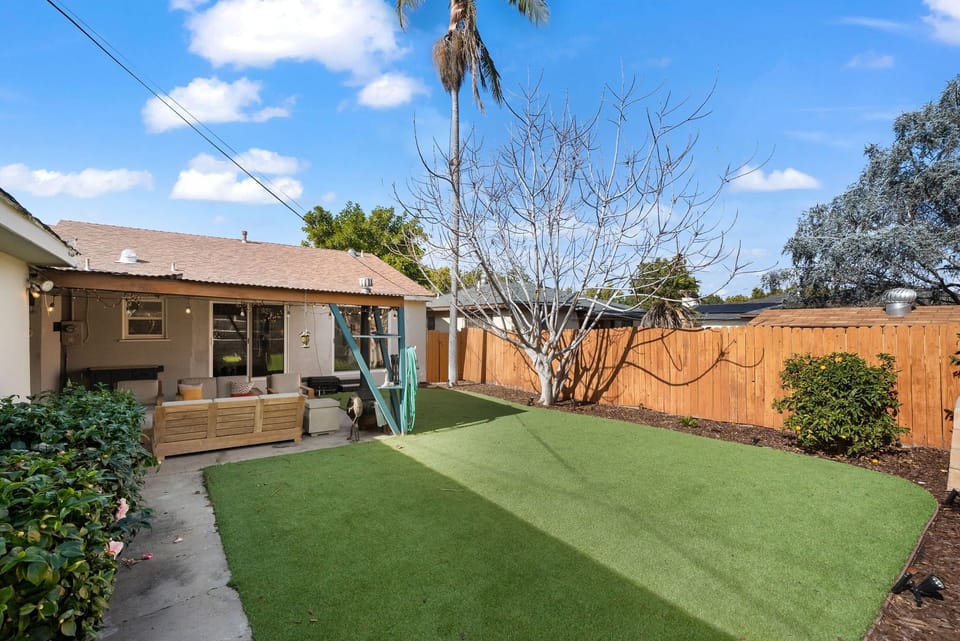 Sunny backyard perfect for play and relaxation