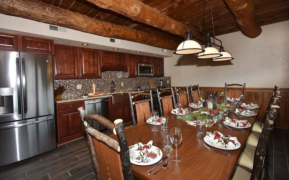 Spacious dining area with a rustic touch, perfect for enjoying meals together in a cozy, inviting atmosphere.