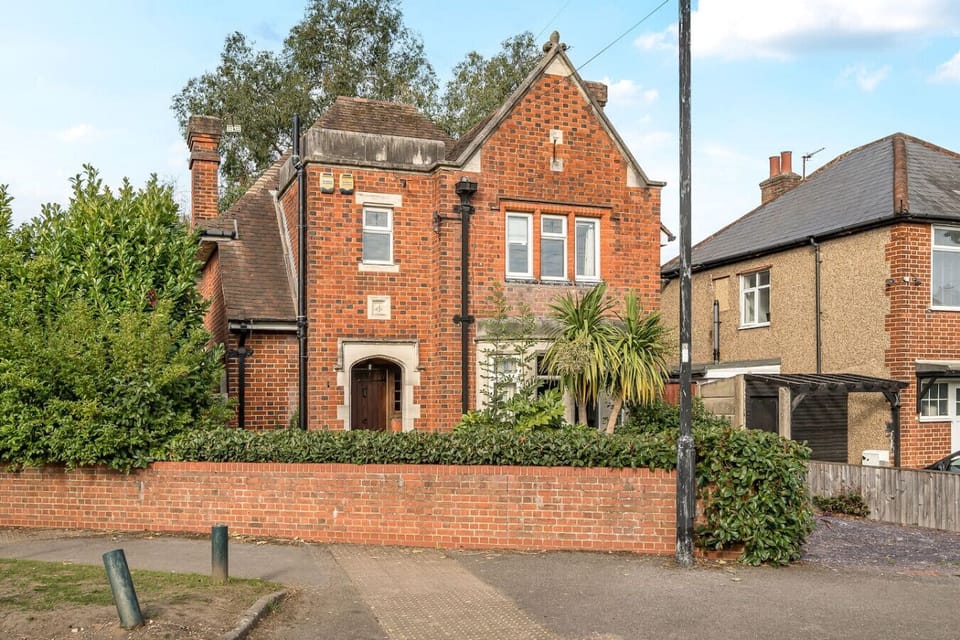 Exterior view of the spacious Orchard House with gated drive