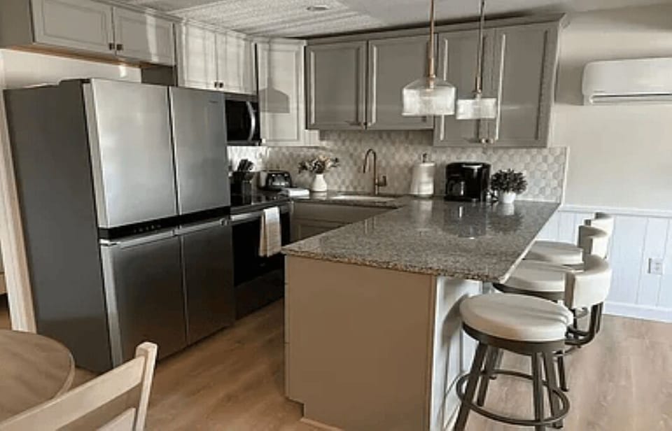 modernized kitchen with full fridge