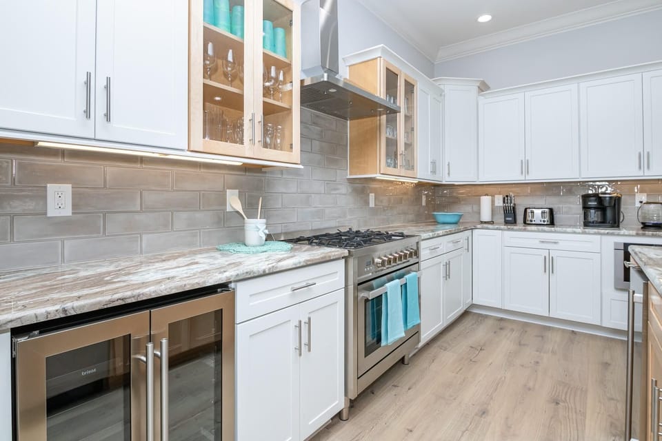 Modern kitchen with sleek appliances and spacious countertops