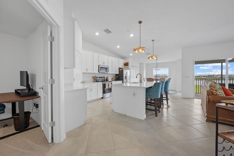 Office on the left before entering the spacious open concept living areas.