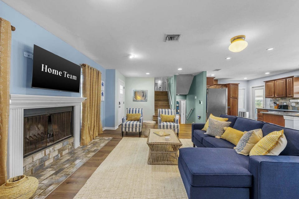 Stretch out, snuggle up, and stay awhile. This living room was designed for one thing: total relaxation (with a side of fun).