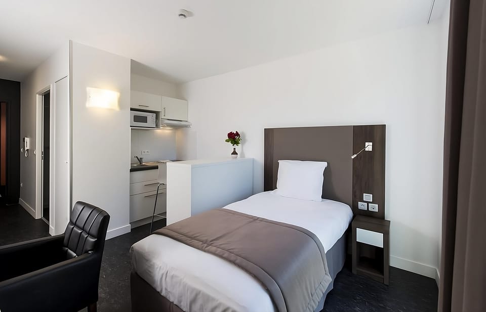 Settle in comfortably with your kitchenette just steps away.