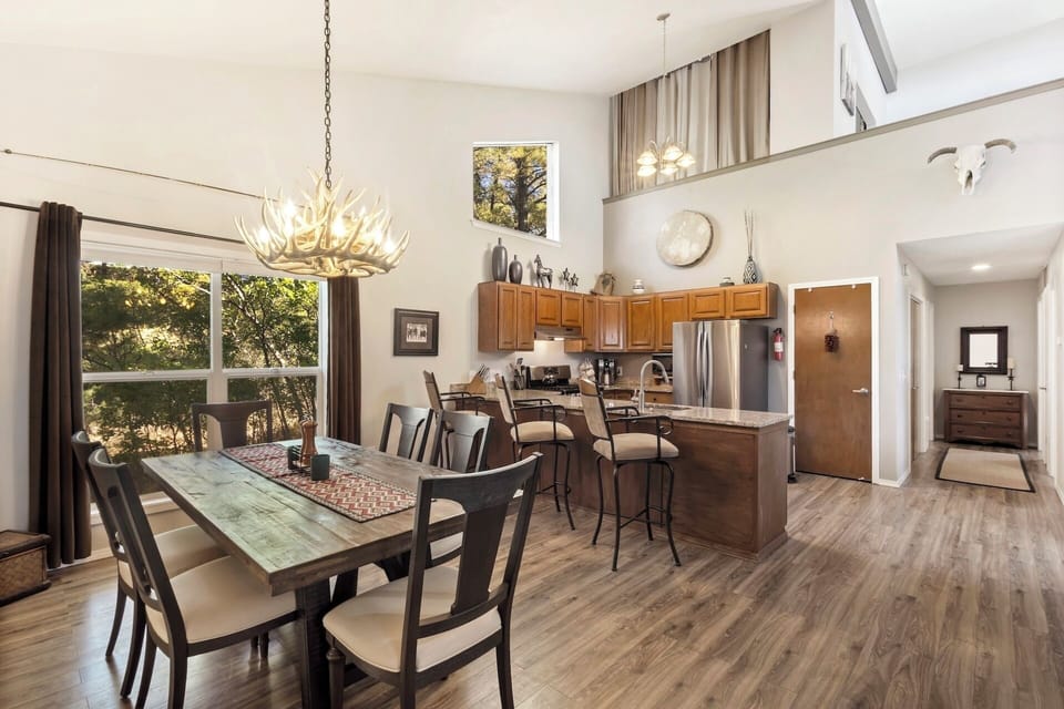 Fully equipped galley kitchen with stainless steel appliances, granite countertops.  Open to the dining area and living room.