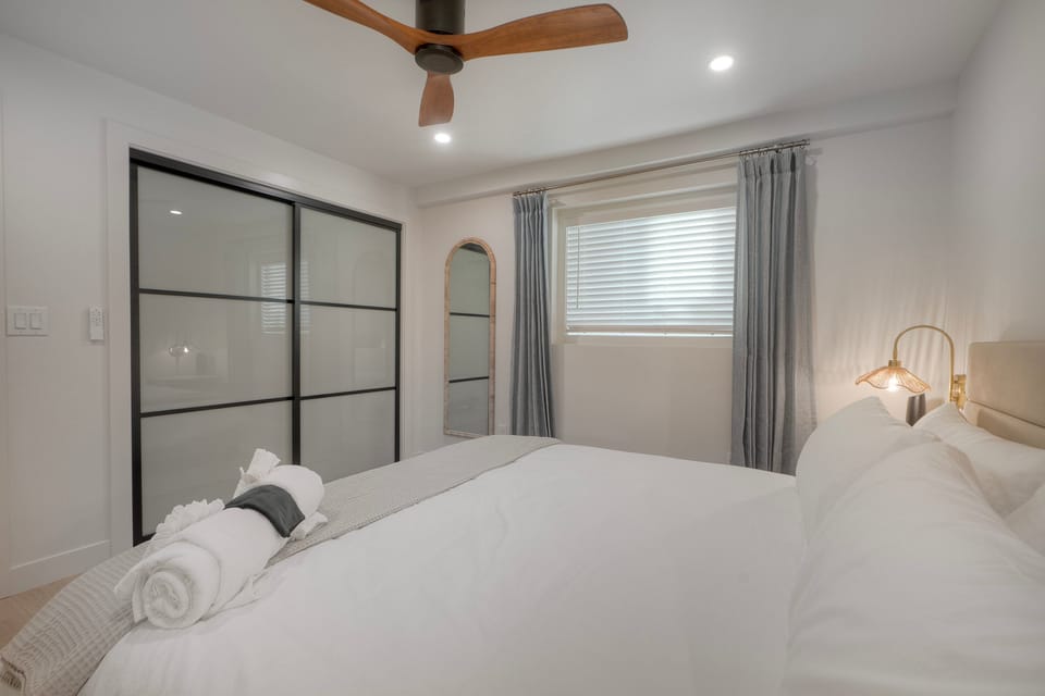 Stylish secondary bedroom with ample closet space