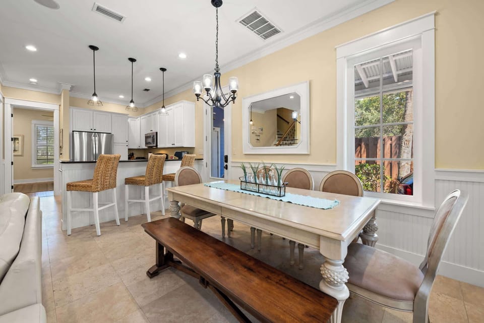 The dining table comfortably seats 8.