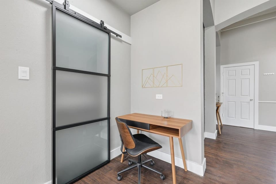 Need a quiet spot to finish up some work or get some studying done? This dedicated work station offers you a desk, chair, and electrical outlet to help you be productive. 