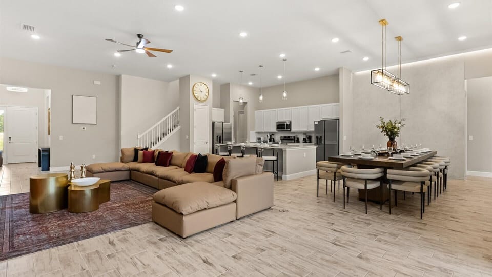 Contemporary living space – unwind and dine in a comfortable lounge and dining area filled with natural light