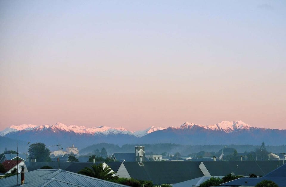 The Southern Alps stand watch. A view from town, but also from your pillow - majestic and grounding.