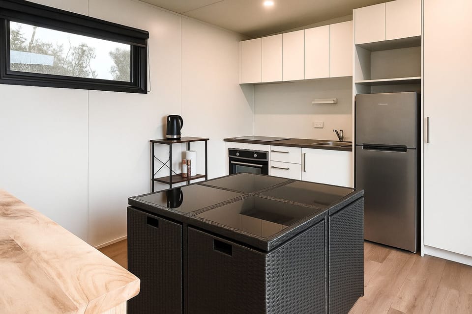 Cook with a view - the kitchen flows into the living space, light and open.