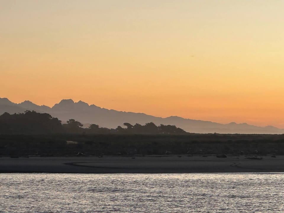 The Southern Alps on the horizon - Aoraki/Mount Cook in the distance.