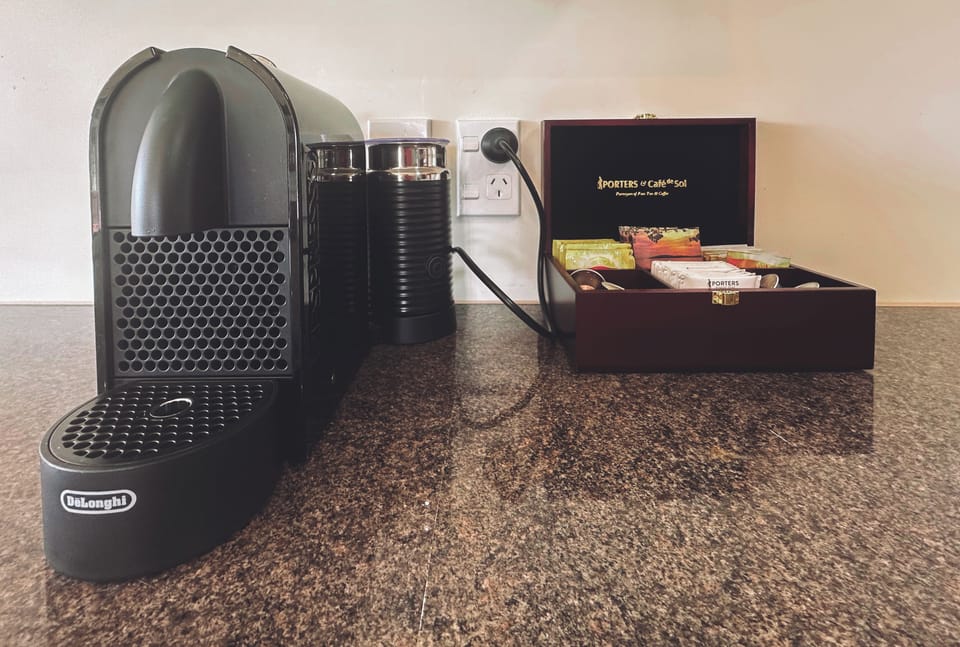 Start your day right. A fresh brew, your favourite mug, and the scent of pine drifting in.