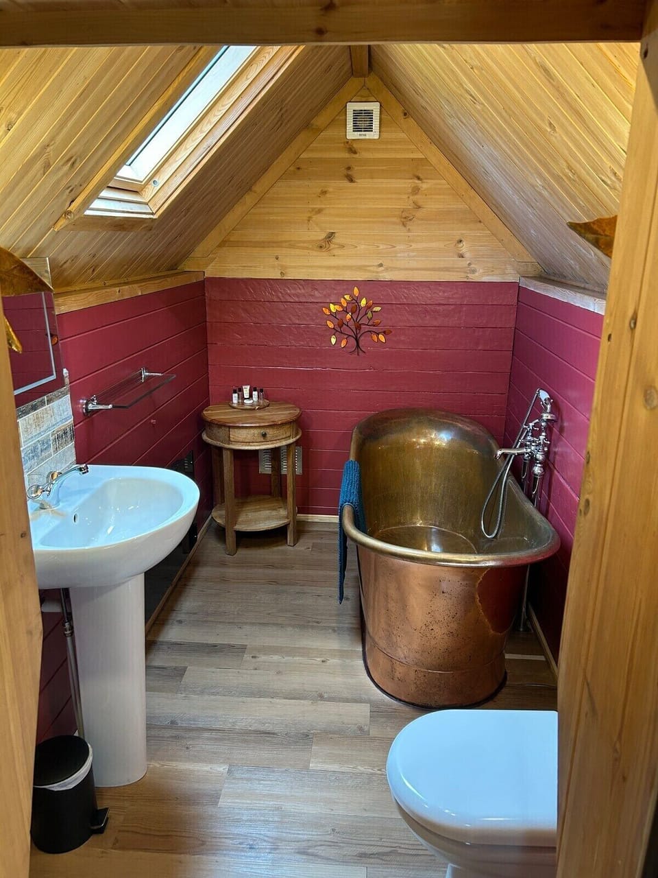 With copper bath and luxury toilettries