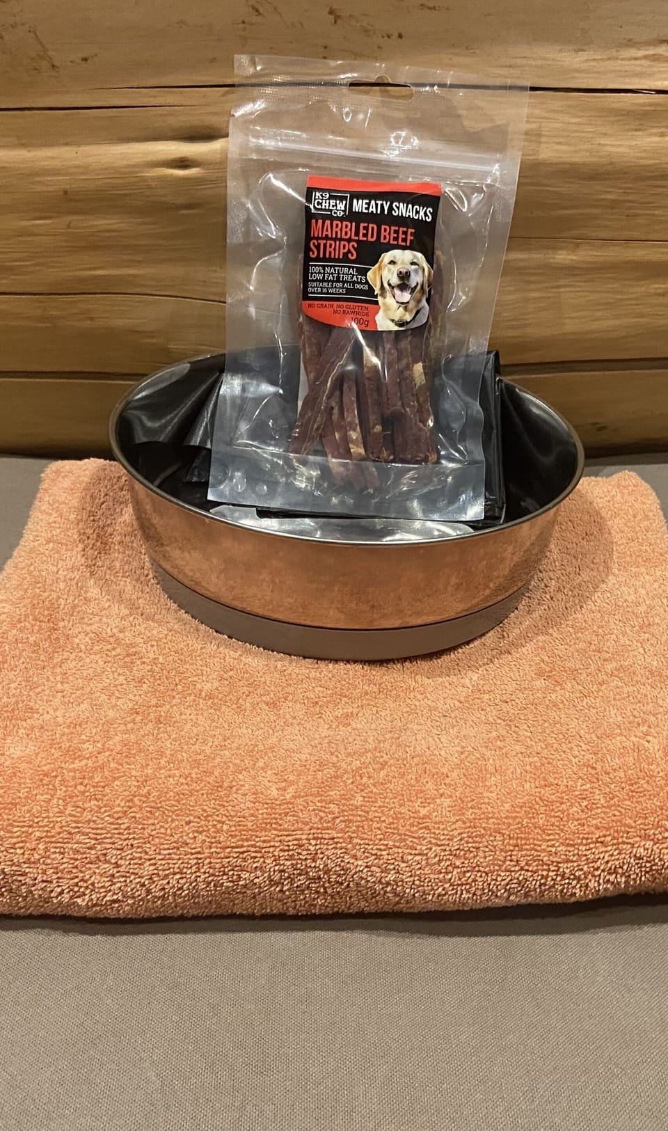 Dog bed, treats, bowl and towel provided
