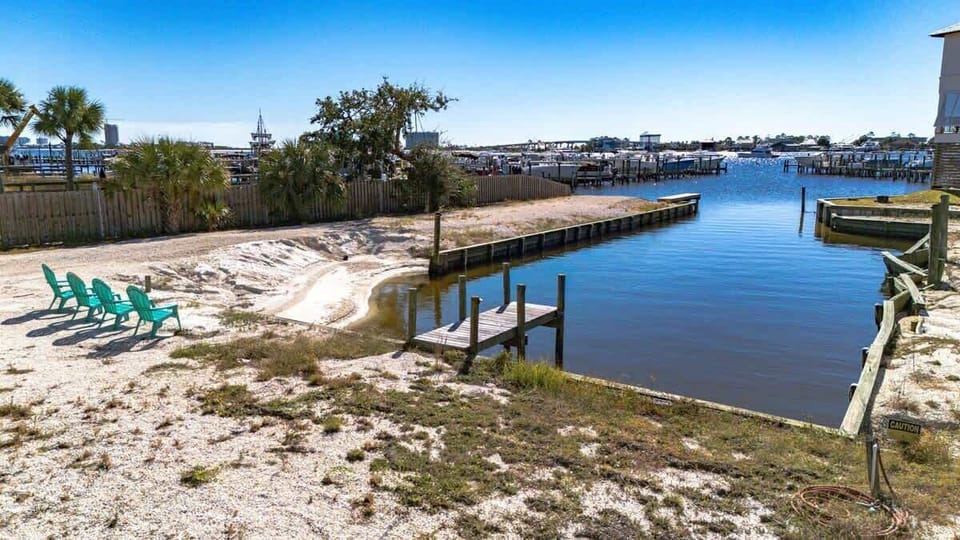 Relax by the water with stunning lagoon views, comfortable Adirondack seating, and peaceful access to the marina perfect for morning coffee, sunset chats, or simply unwinding by the shoreline.