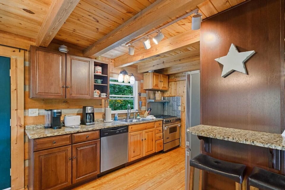 Grandfather Vista kitchen with gas stove, large refrigerator, microwave, Keurig.