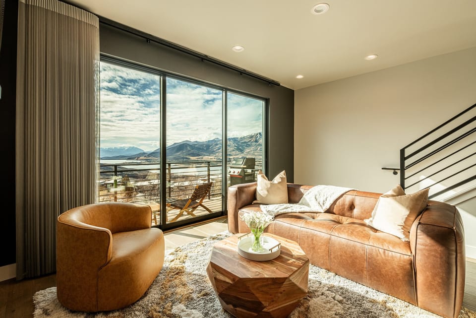 Main Living Room (2nd Floor) with floor-to-ceiling windows and new furnishings
