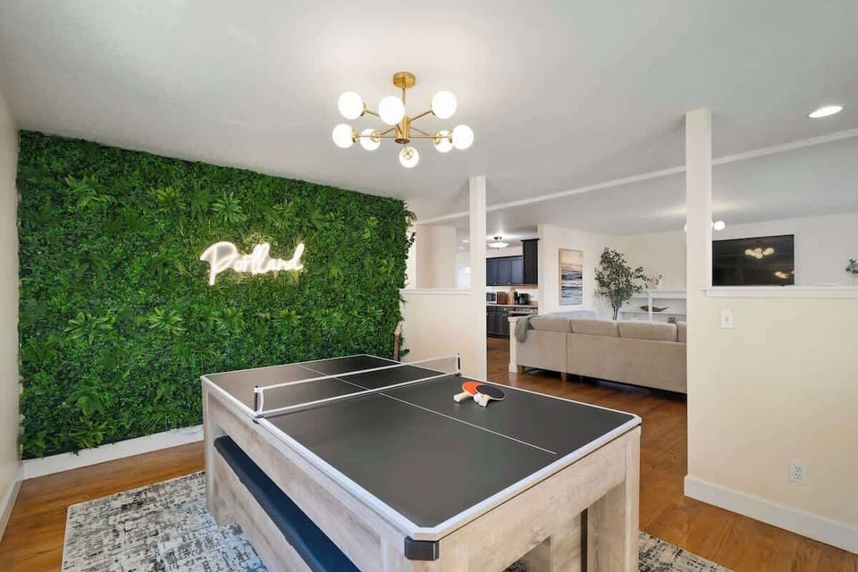 Large space with pool and ping pong tables, offering endless entertainment for everyone.