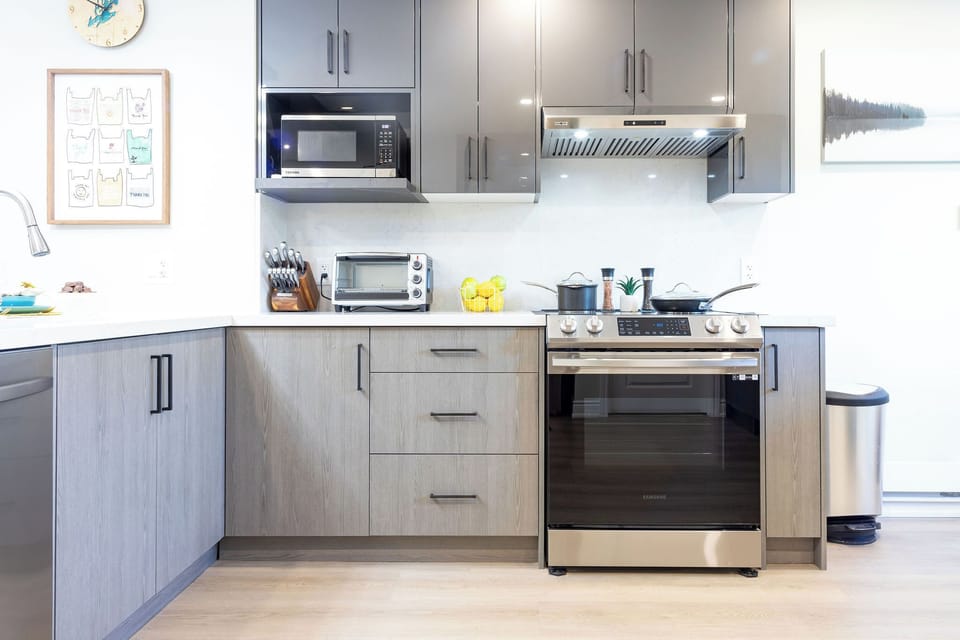 Fully appointed kitchen including, All the utensils, Plates mugs, wine and drinking glasses you'll need. Refrigerator, Induction stove/oven, toaster oven, microwave, and dishwasher. Also available coffee maker, toaster, blender...etc