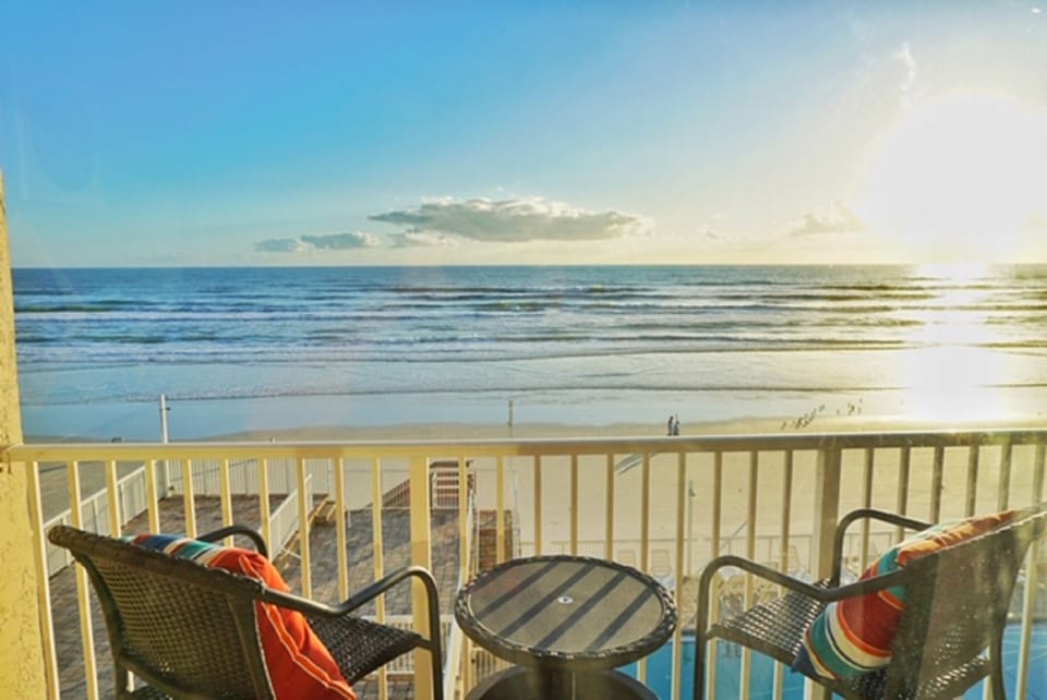 Relax with a cup of coffee and stunning sea views on the balcony.