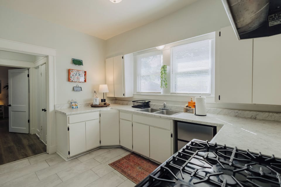 Full Kitchen with stainless steel appliances, including coffee, decaf coffee tea