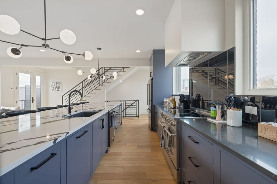 Fully equipped kitchen with generous counter space and modern appliances.