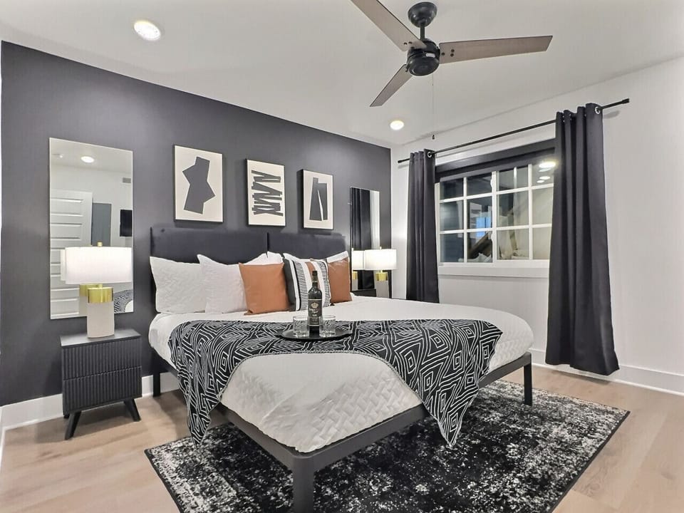 Bright and elegant bedroom designed for comfort and relaxation in this furnished apartment.