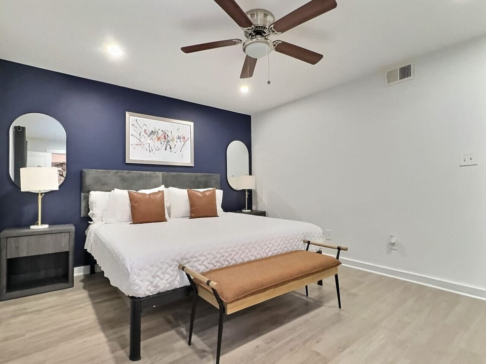 Bright and elegant bedroom designed for comfort and relaxation in this furnished apartment.